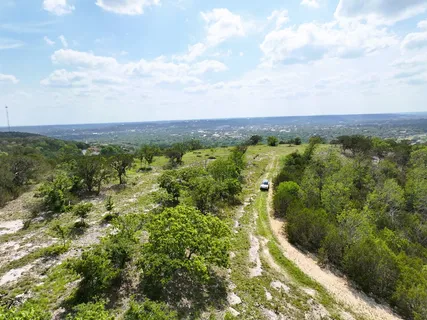 a view of a city with lots of trees