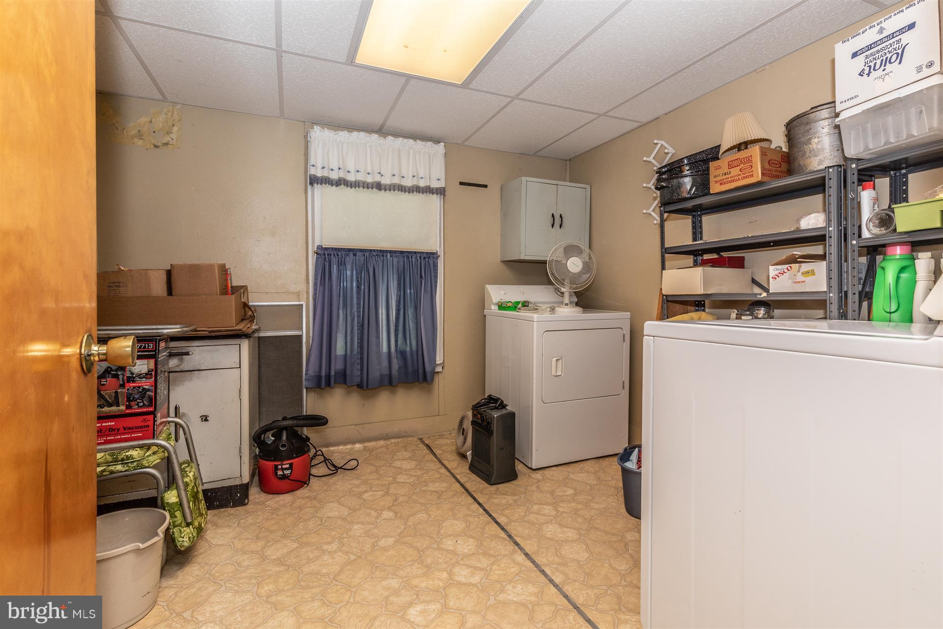 11324 Angleberger Road Thurmont, MD 21788 - Photo 13 of 27 Large laundry room off kitchen, leads to storage.