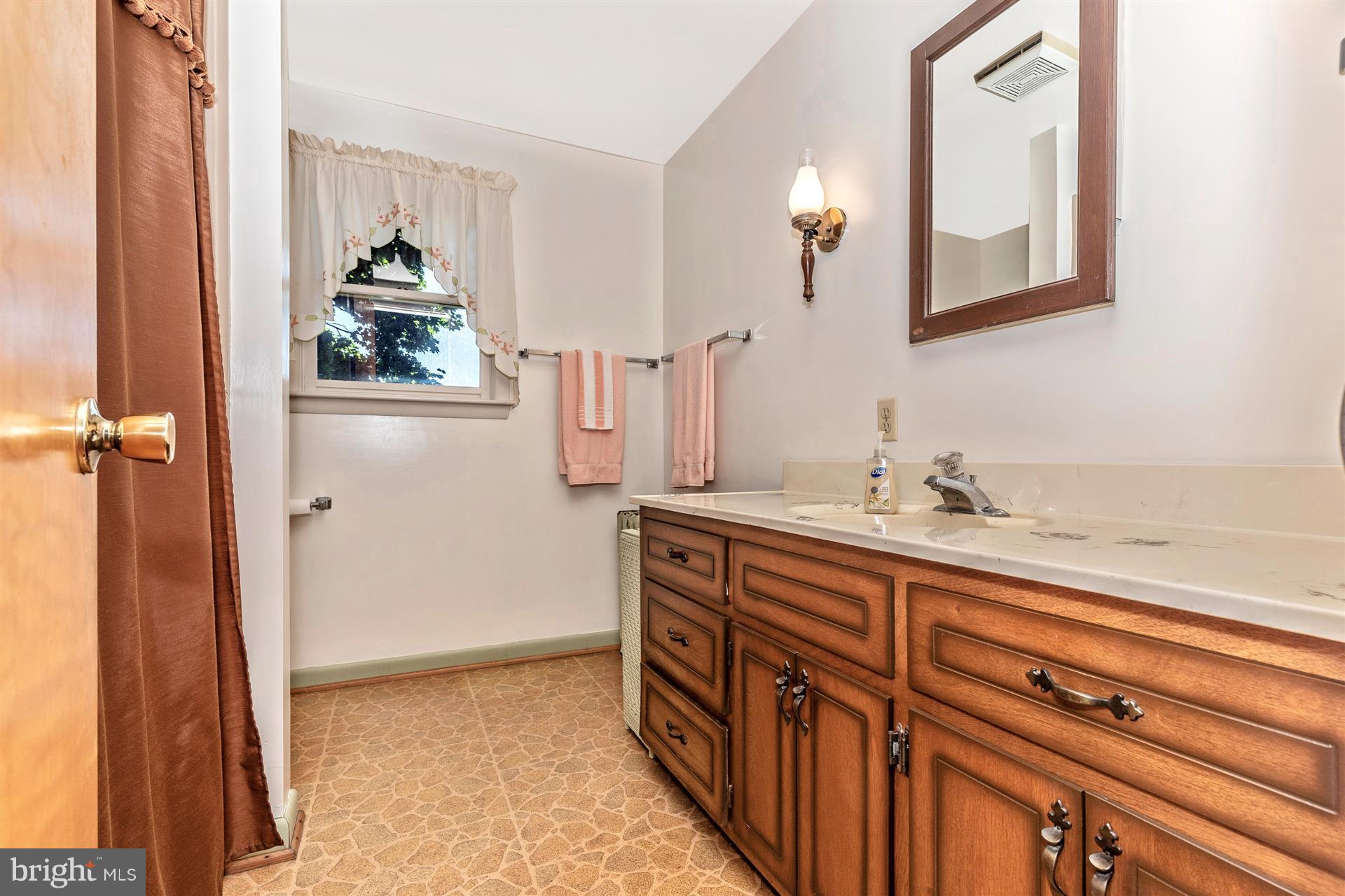 11324 Angleberger Road Thurmont, MD 21788 - Photo 14 of 27 Main level full bath is so convenient