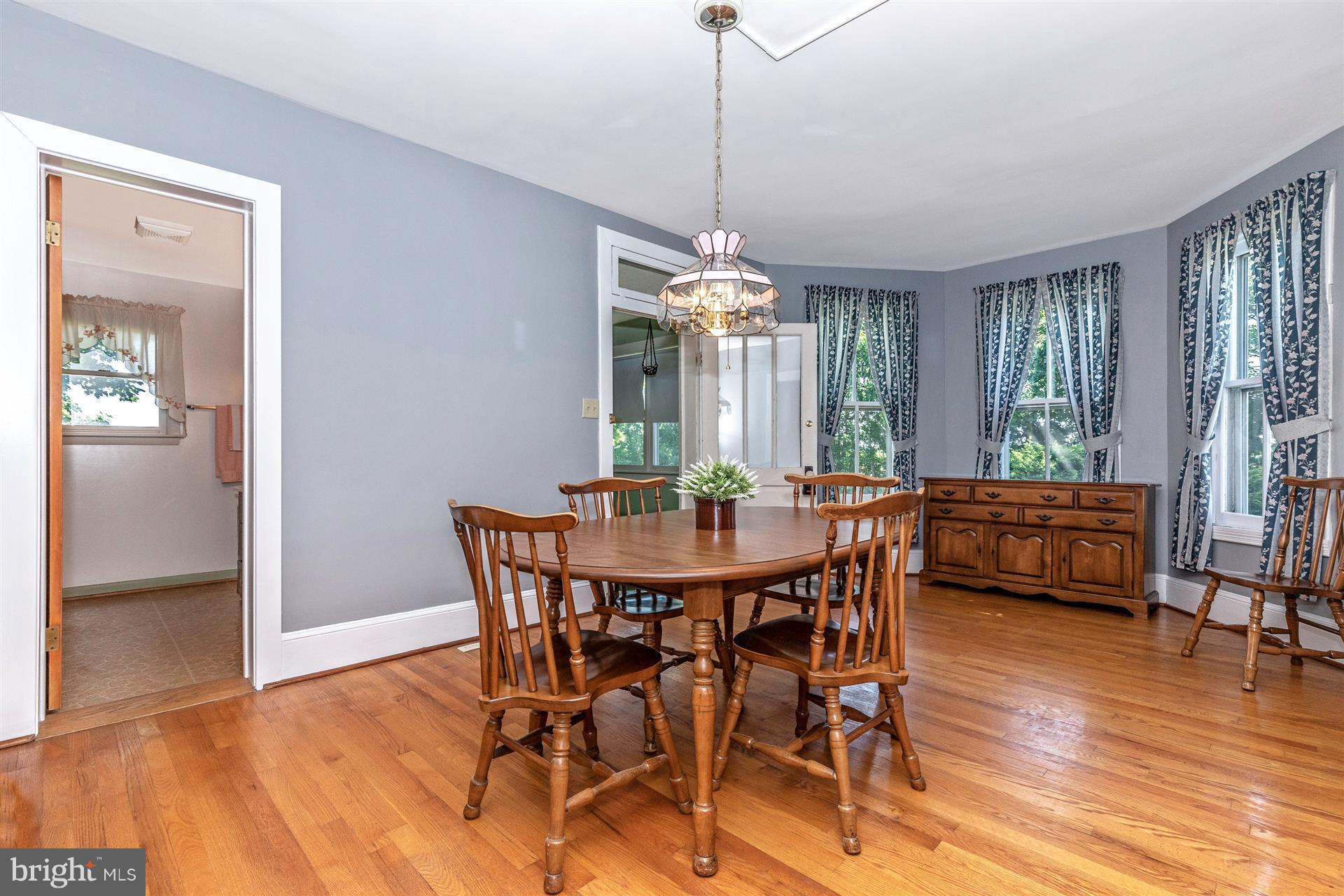 11324 Angleberger Road Thurmont, MD 21788 - Photo 9 of 27 Dining Room has hardwood, bayed area