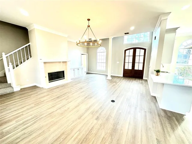 a view of a yard with a tree