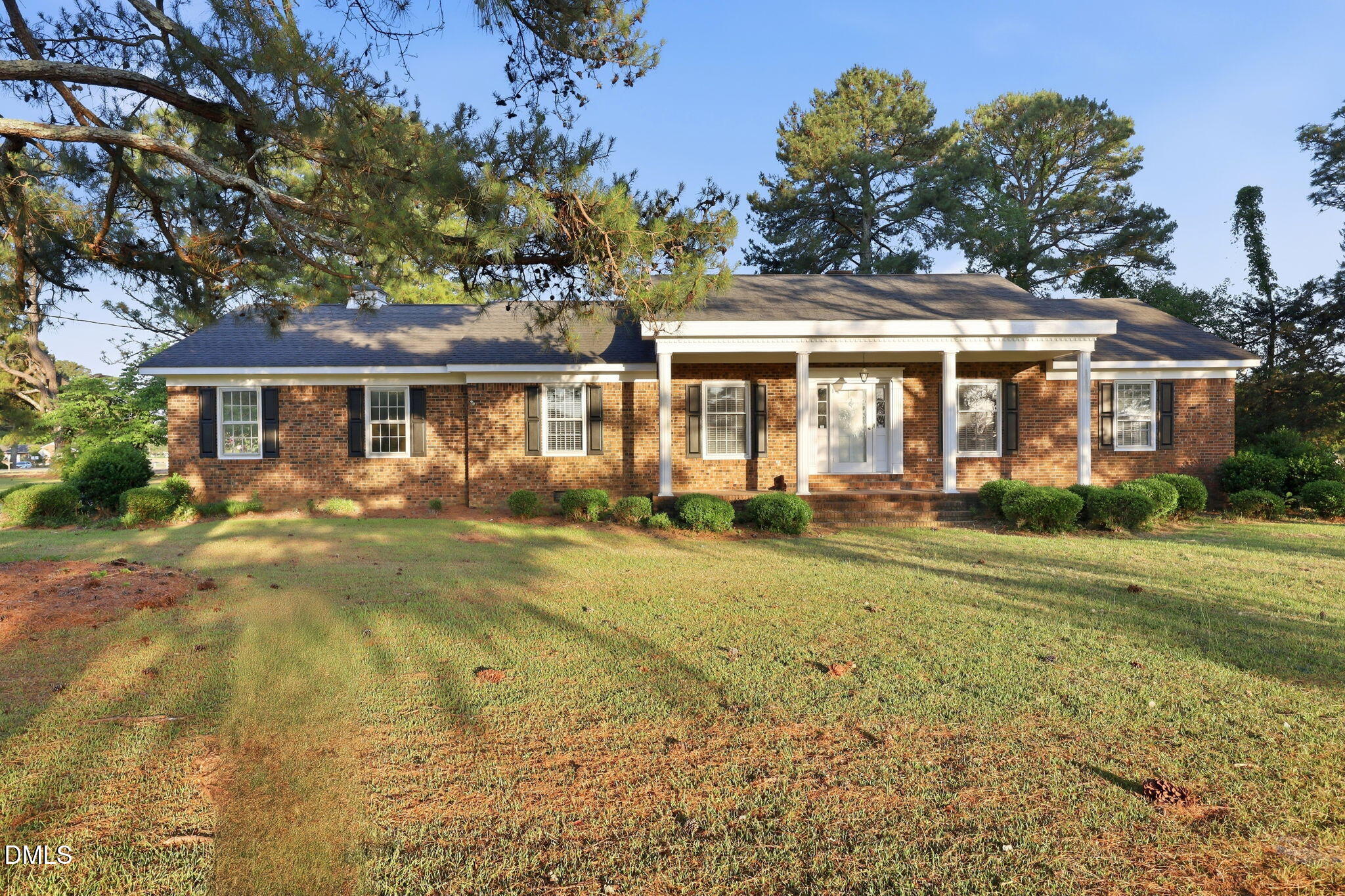 1130 Prospect Church Road Dunn, NC 28334 - Photo 45 of 47 a front view of a house with a yard
