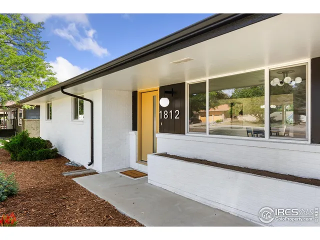 a front view of a house with a porch