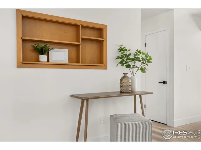 a potted plant sitting on top of a wall