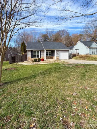 front view of a house with a big yard
