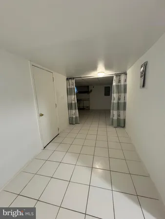 a bathroom with a sink toilet and mirror