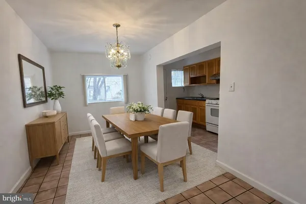 a view of a kitchen with a sink and a stove top oven