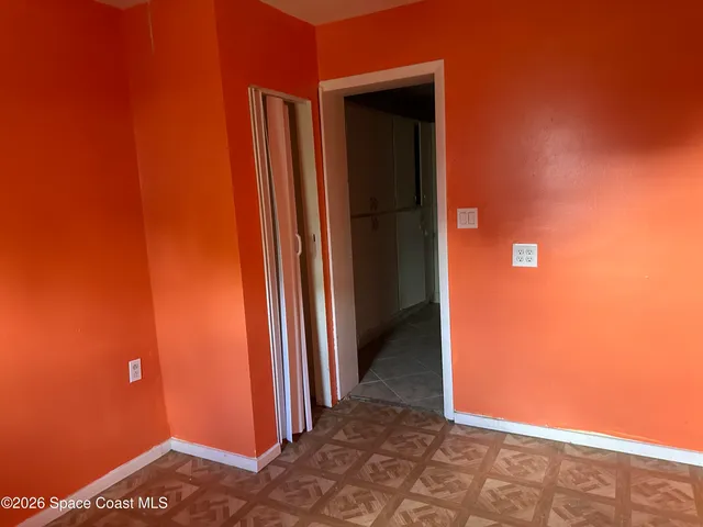 a kitchen with a sink stove and refrigerator