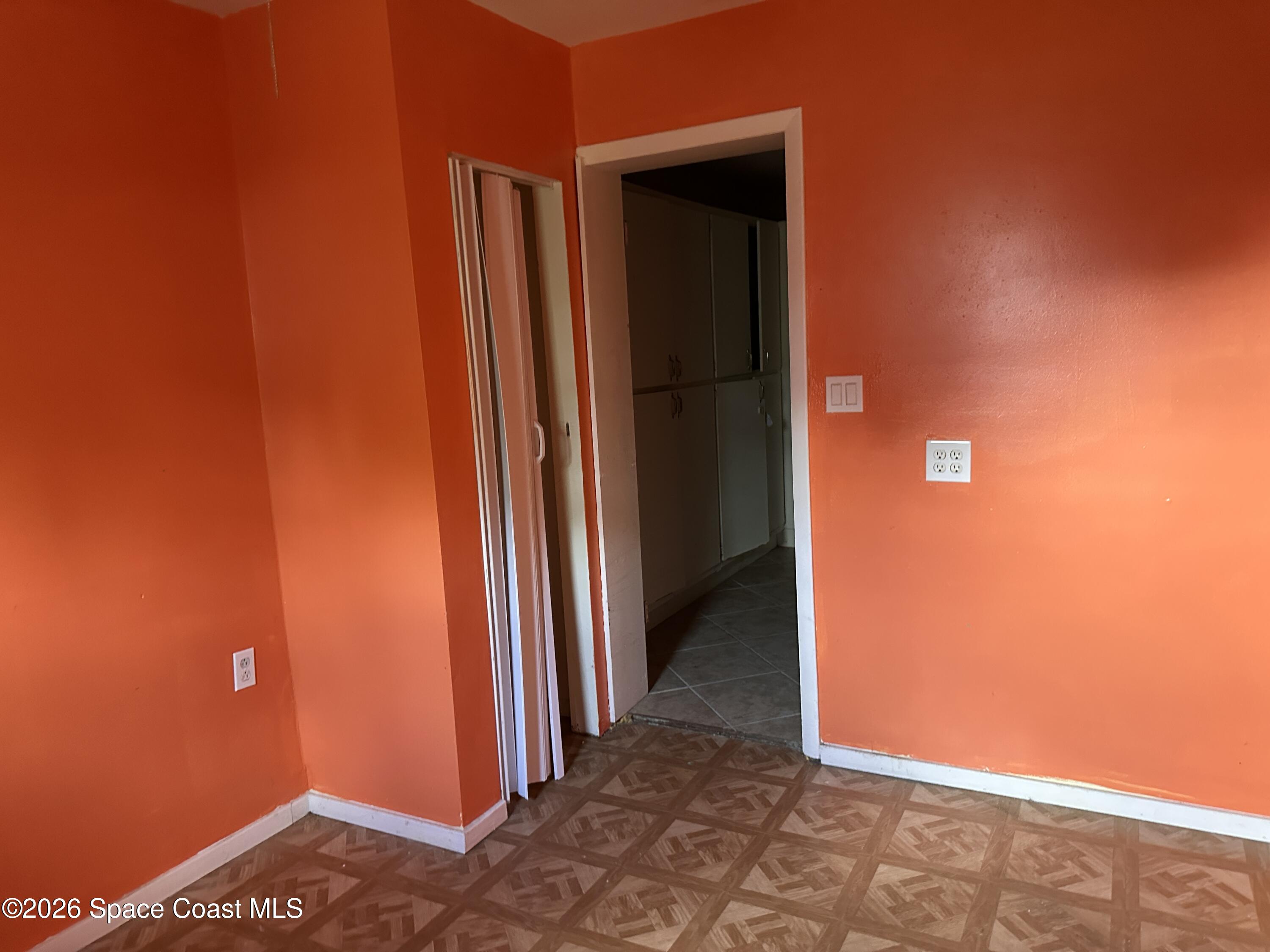 2363 Apache Drive Melbourne, FL 32935 - Photo 13 of 18 a view of a hallway with closet