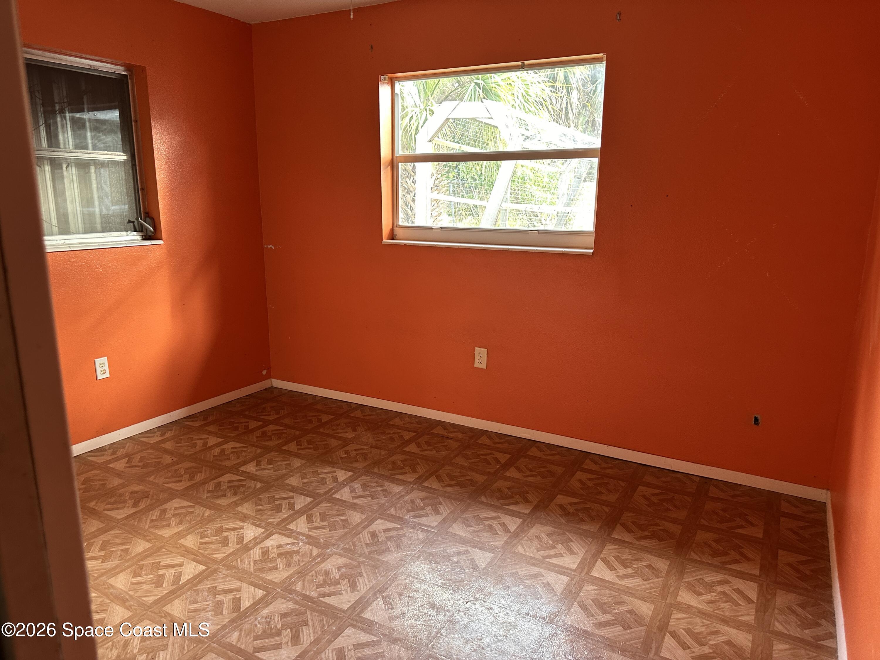 2363 Apache Drive Melbourne, FL 32935 - Photo 16 of 18 an empty room with a window