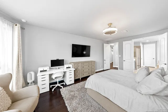 a bathroom with a double vanity sink mirror and
