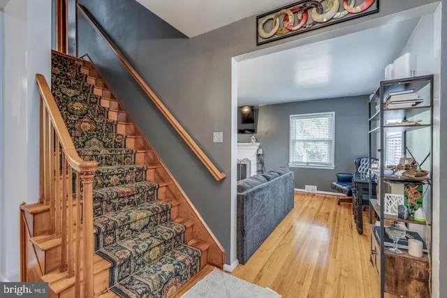 a view of entryway with wooden floor