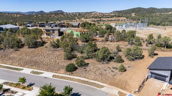 a view of a city with mountain