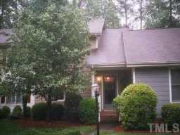 1522 Edgeside Court Raleigh, NC 27609 - Photo 1 of 1 a front view of a building with garden