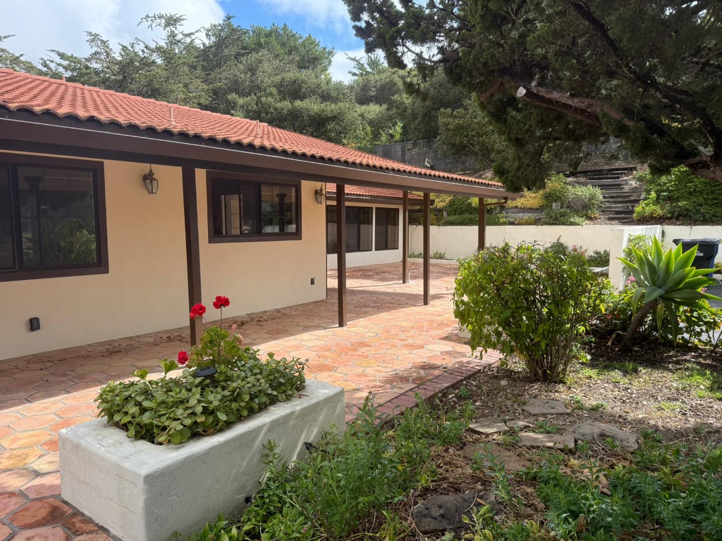 11585 McCarthy Road Carmel Valley, CA 93924 - Photo 20 of 52 a view of a house with a garden