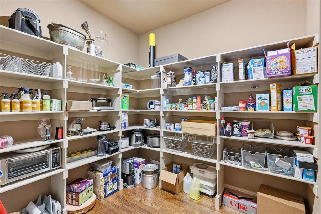 406 Spurgin Road Lucas, TX 75002 - Photo 13 of 39 a view of a workspace with bookshelf
