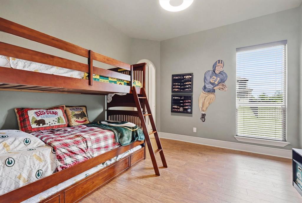 406 Spurgin Road Lucas, TX 75002 - Photo 19 of 39 a bedroom with a bed and a window