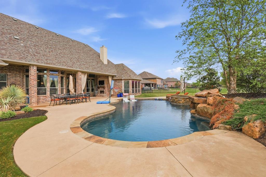 406 Spurgin Road Lucas, TX 75002 - Photo 30 of 39 a view of a house with swimming pool and sitting area