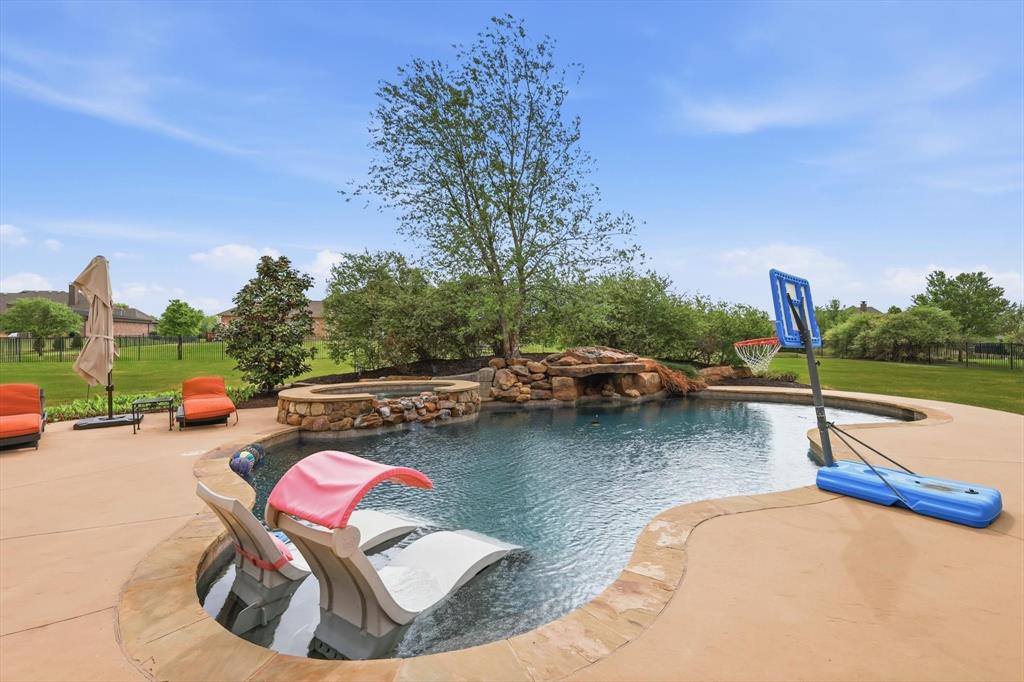 406 Spurgin Road Lucas, TX 75002 - Photo 31 of 39 a view of outdoor space with swimming pool and furniture