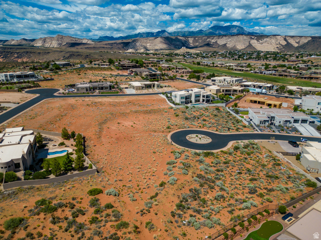 Basalt Cir Street, Unit 1027 St. George, UT 84770 - Photo 24 of 29 Aerial view of residential area featuring mountains
