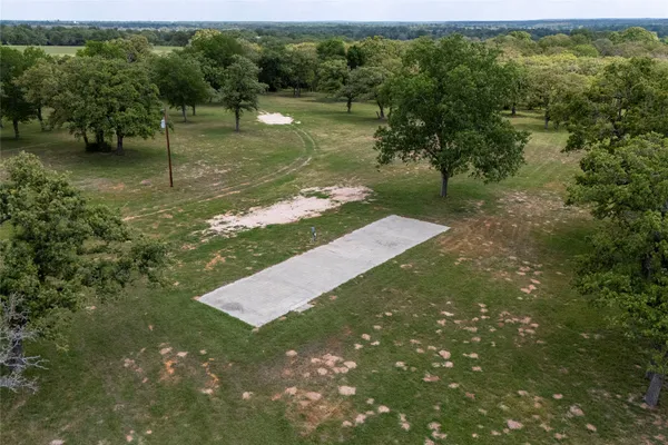 a view of a lake view with a large trees