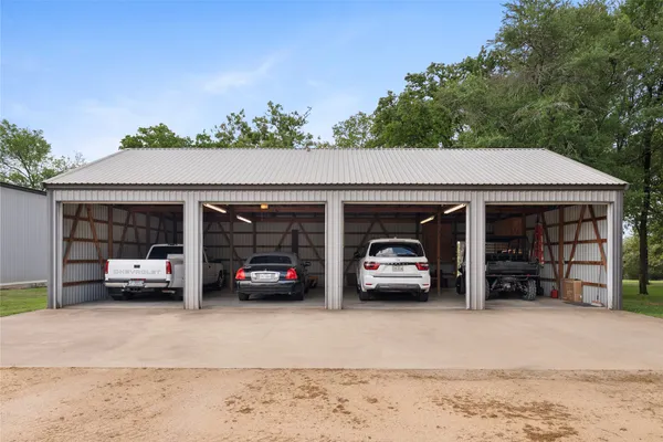a view of a car parked in front of a building
