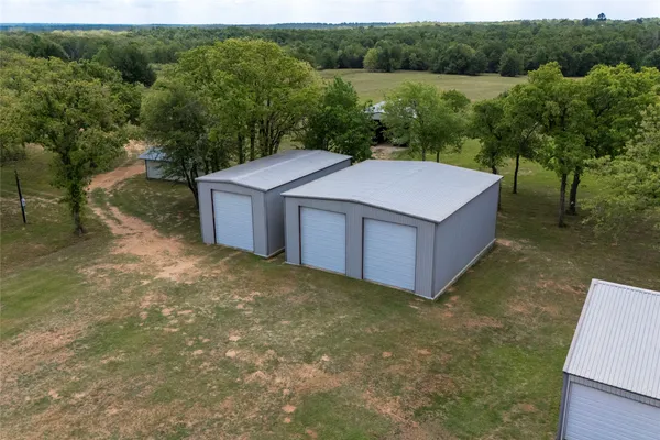 an aerial view of a house having yard