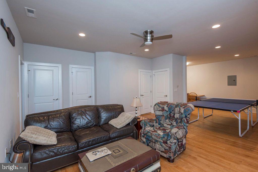 237 Bridge Street, Unit 401 Phoenixville, PA 19460 - Photo 4 of 8 a living room with furniture