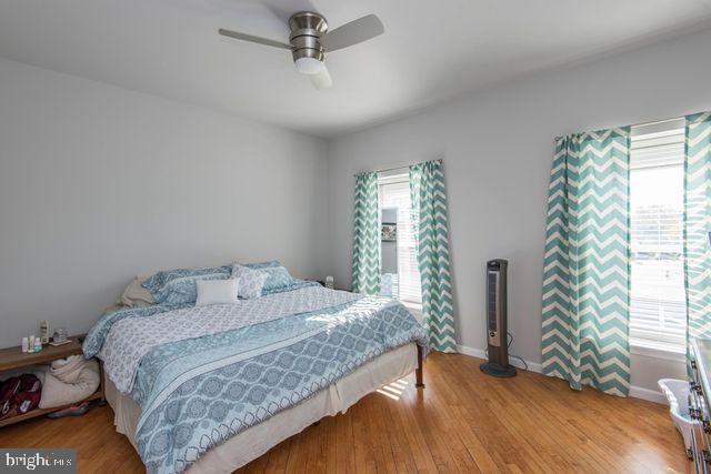 237 Bridge Street, Unit 401 Phoenixville, PA 19460 - Photo 6 of 8 a bedroom with a bed and a window
