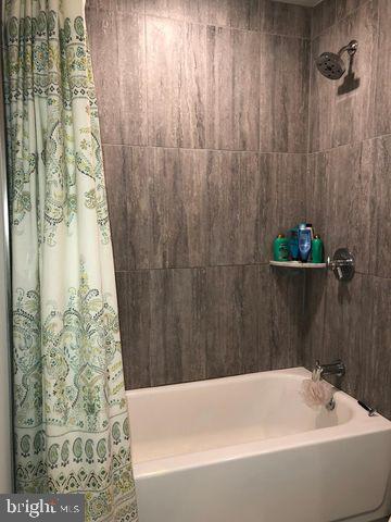 237 Bridge Street, Unit 401 Phoenixville, PA 19460 - Photo 8 of 8 a bathroom with a bathtub and shower