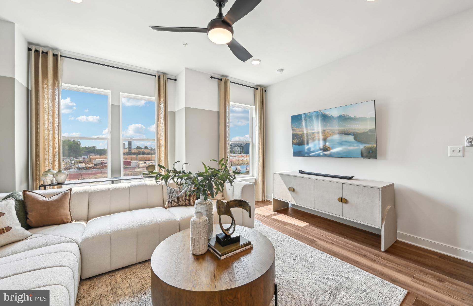 503 Crossvine Lane Laurel, MD 20724 - Photo 5 of 24 a living room with furniture and a large window