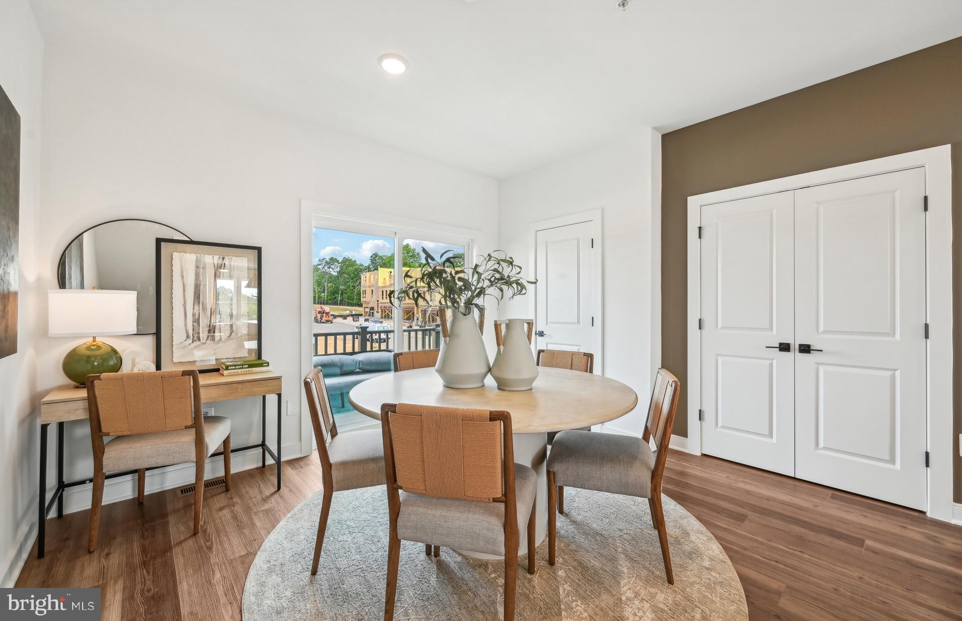 503 Crossvine Lane Laurel, MD 20724 - Photo 7 of 24 a dining room with furniture and wooden floor