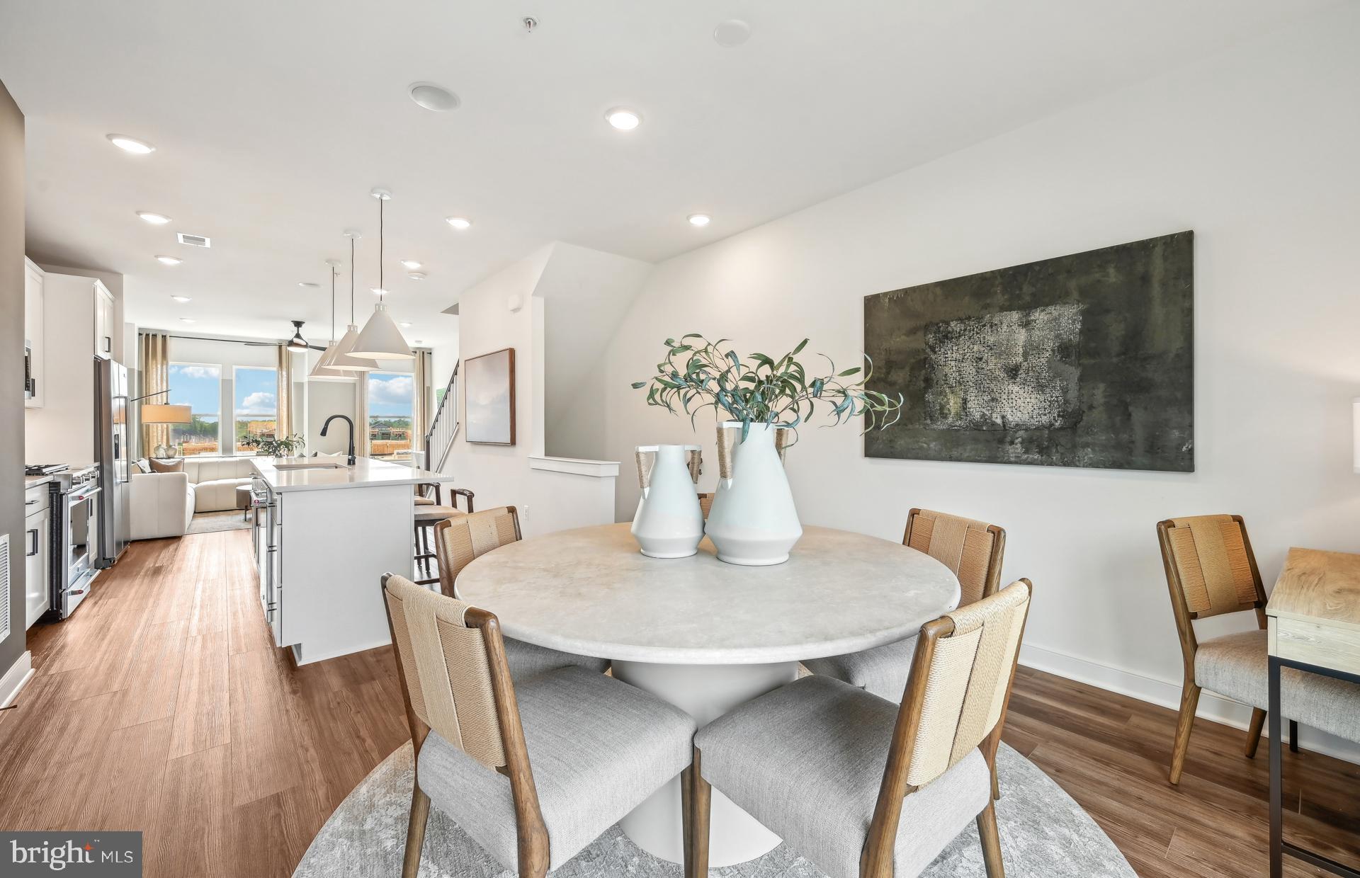 503 Crossvine Lane Laurel, MD 20724 - Photo 9 of 24 a dining room with furniture and wooden floor