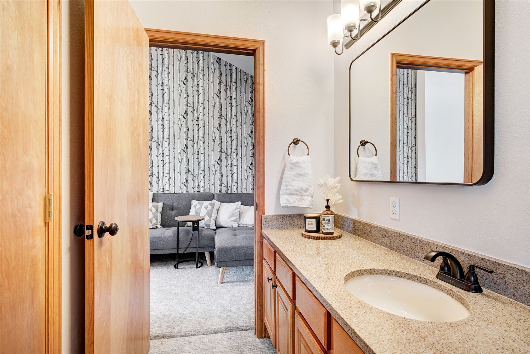 3710 Ryan Gulch Road, Unit 378 Silverthorne, CO 80498 - Photo 22 of 31 Bathroom with vanity, ensuite bathroom, and light colored carpet