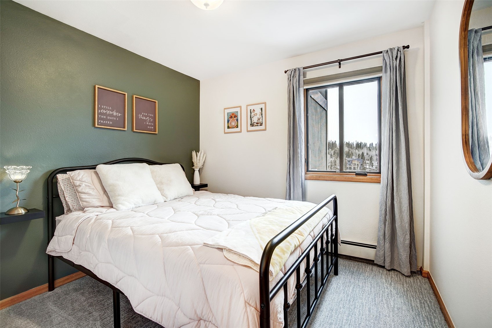 3710 Ryan Gulch Road, Unit 378 Silverthorne, CO 80498 - Photo 23 of 31 Carpeted bedroom with baseboard heating and baseboards