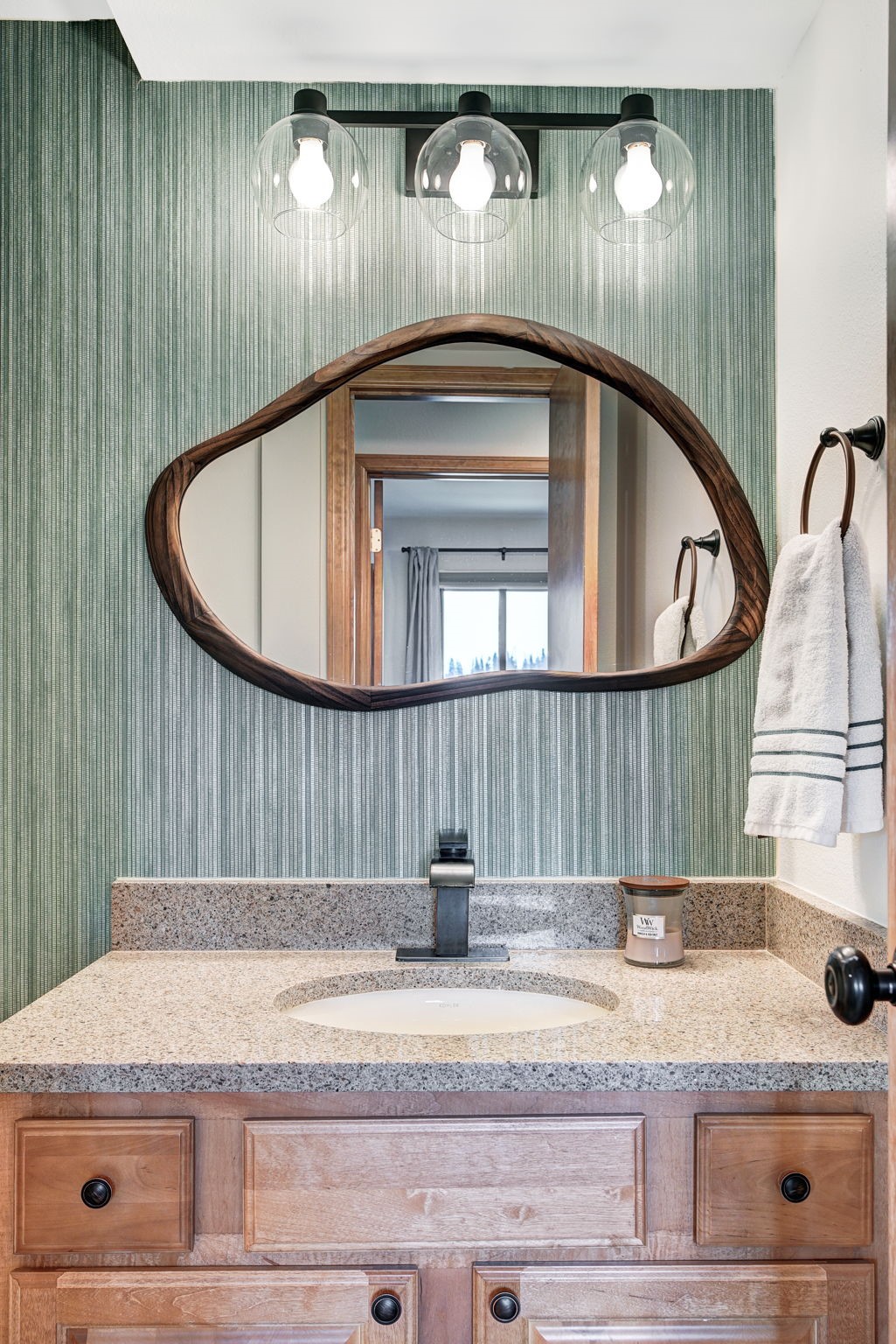 3710 Ryan Gulch Road, Unit 378 Silverthorne, CO 80498 - Photo 27 of 31 Bathroom with vanity and wallpapered walls