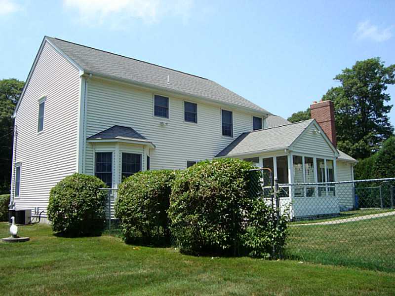 60 Peveril Road Cranston, RI 02921 - Photo 17 of 18 Exterior Front. The yard is partially fenced to keep the kids and pets safe