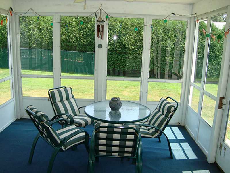 60 Peveril Road Cranston, RI 02921 - Photo 5 of 18 Patio/Deck. Three season room is right off the kitchen