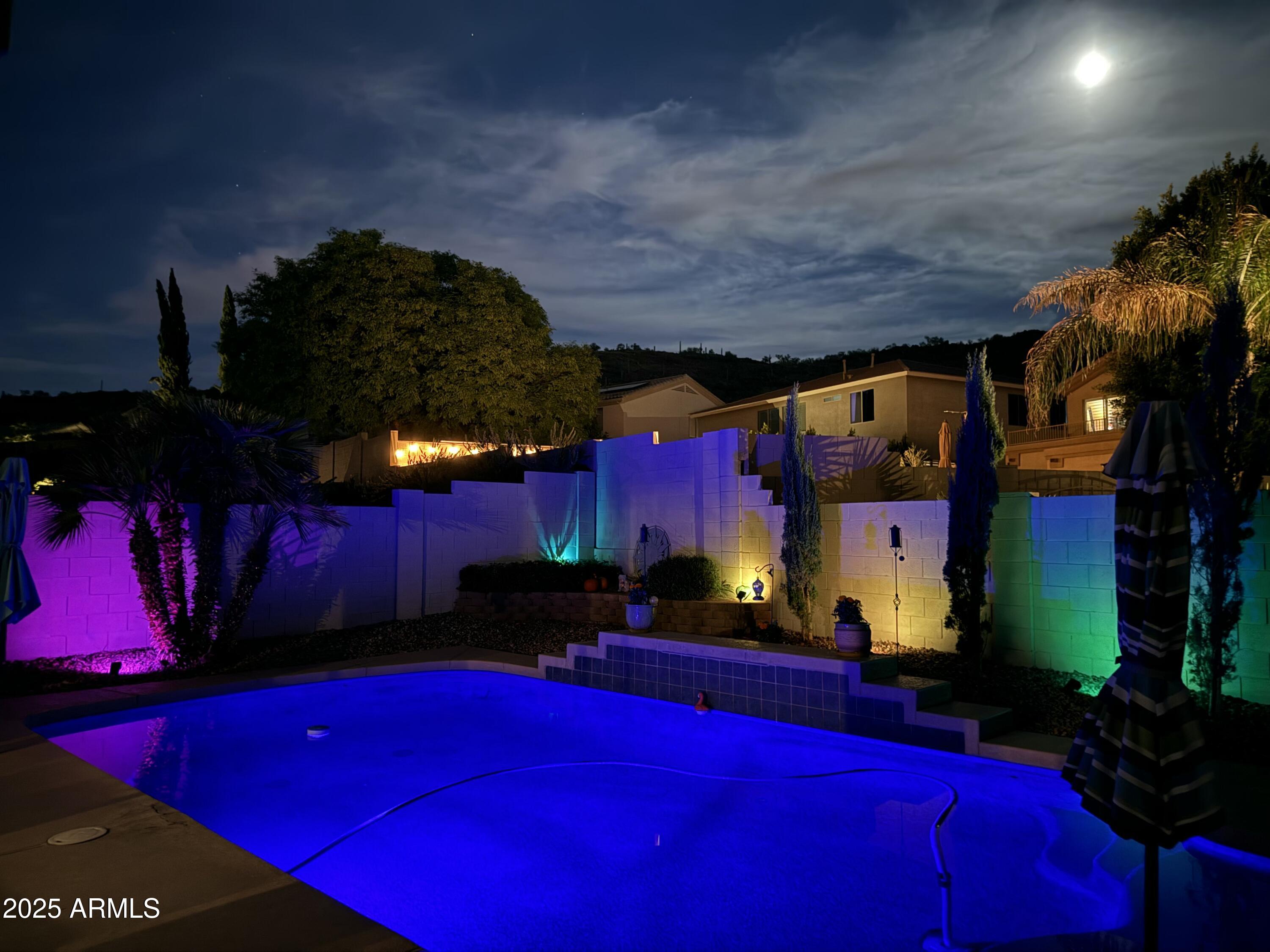 4038 West Alex Loop Phoenix, AZ 85083 - Photo 12 of 36 a view of swimming pool with outdoor seating