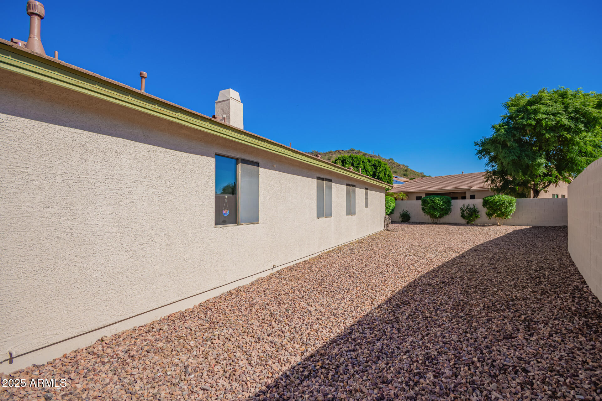 4038 West Alex Loop Phoenix, AZ 85083 - Photo 14 of 37 a front view of a house with a yard