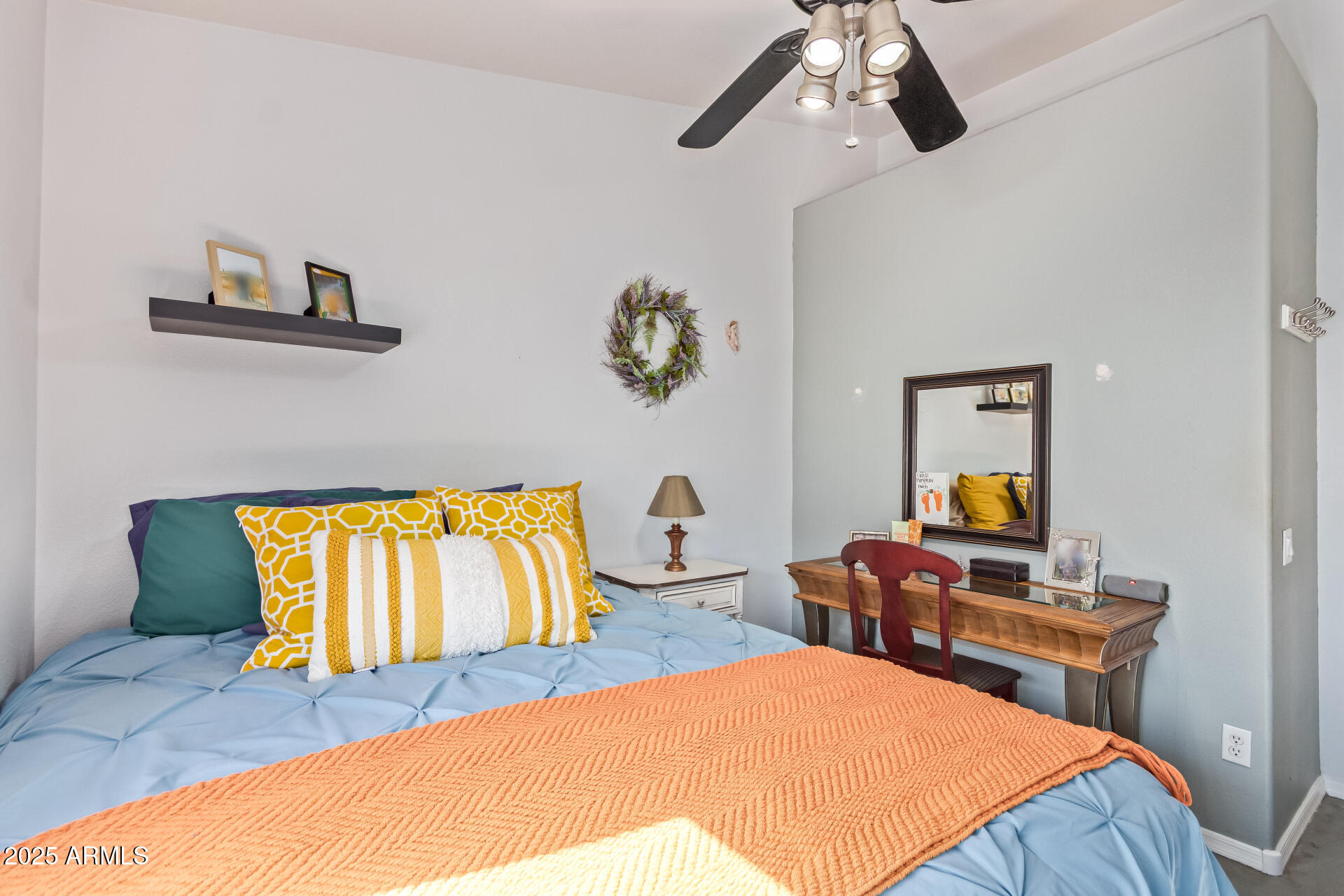 4038 West Alex Loop Phoenix, AZ 85083 - Photo 26 of 37 a bedroom with a bed and dresser