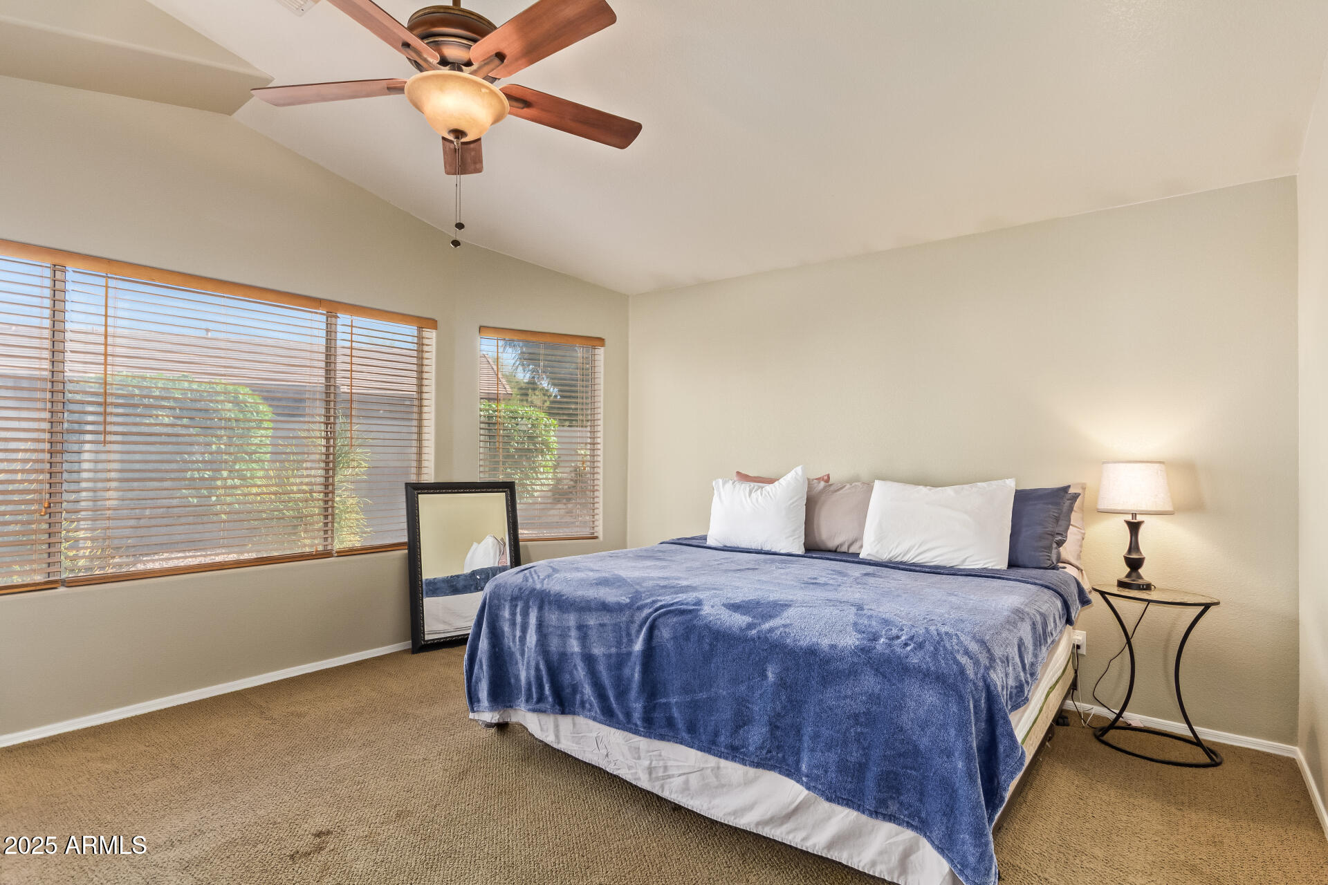 4038 West Alex Loop Phoenix, AZ 85083 - Photo 33 of 37 a bedroom with a bed and window