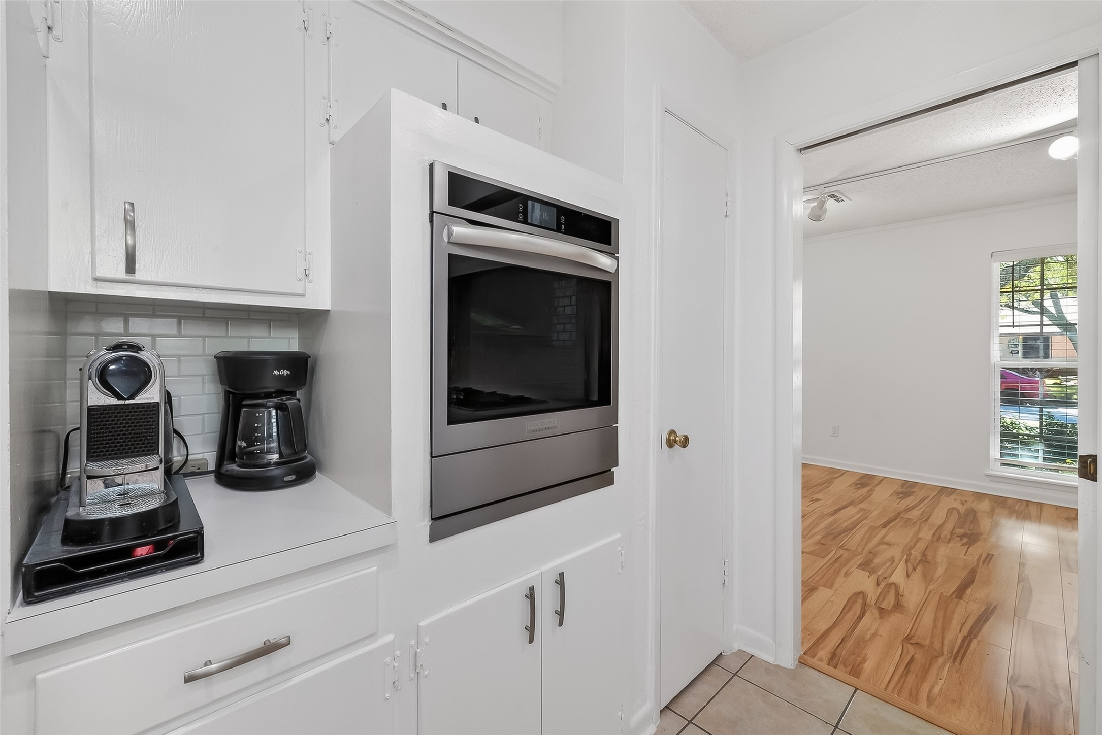 7014 Concho Street Houston, TX 77074 - Photo 18 of 46 There is an area for a coffee bar. The oven is 2025. Note the pantry!