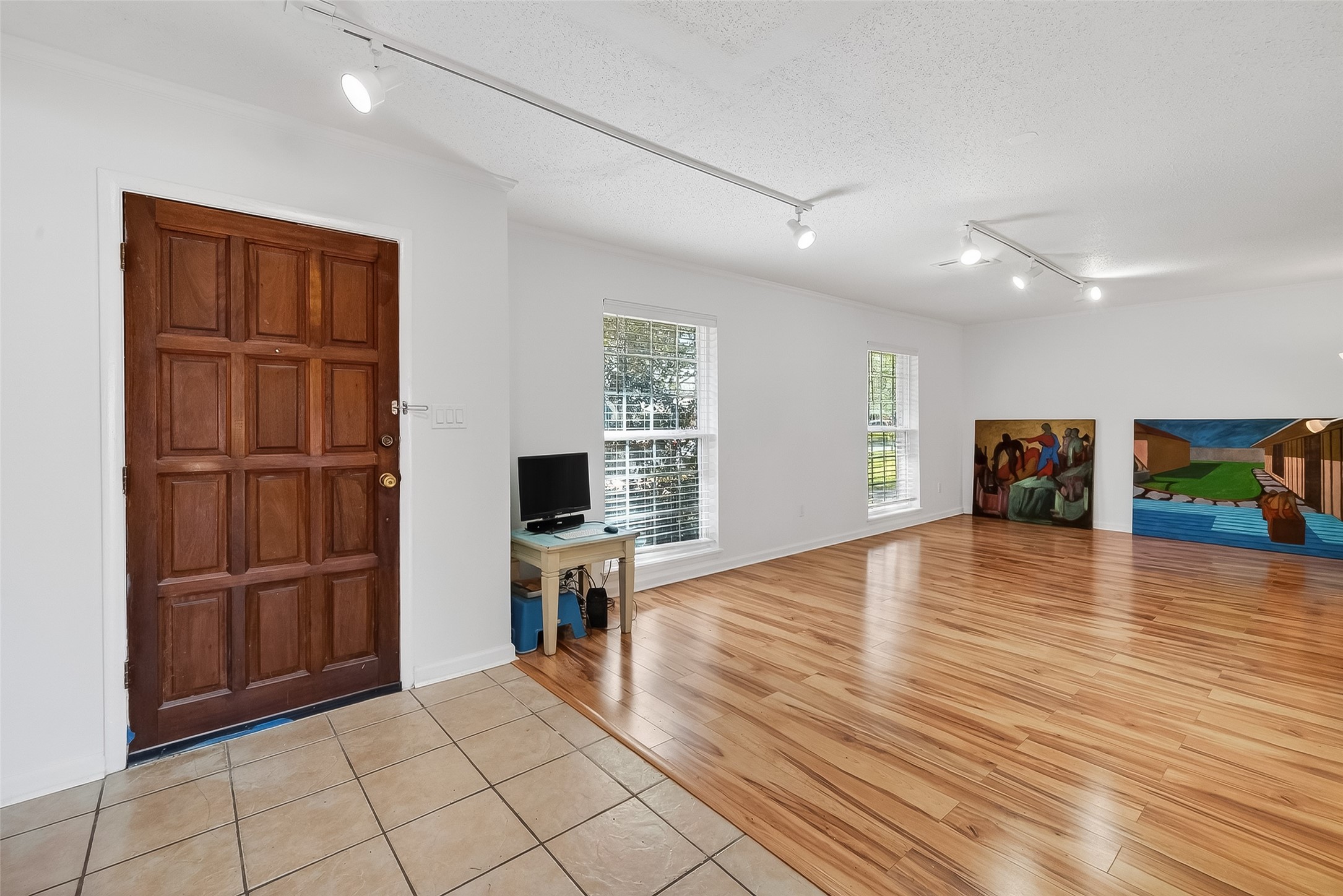 7014 Concho Street Houston, TX 77074 - Photo 4 of 46 The front door enters into a foyer with a large living/dining room combination to your immediate left.