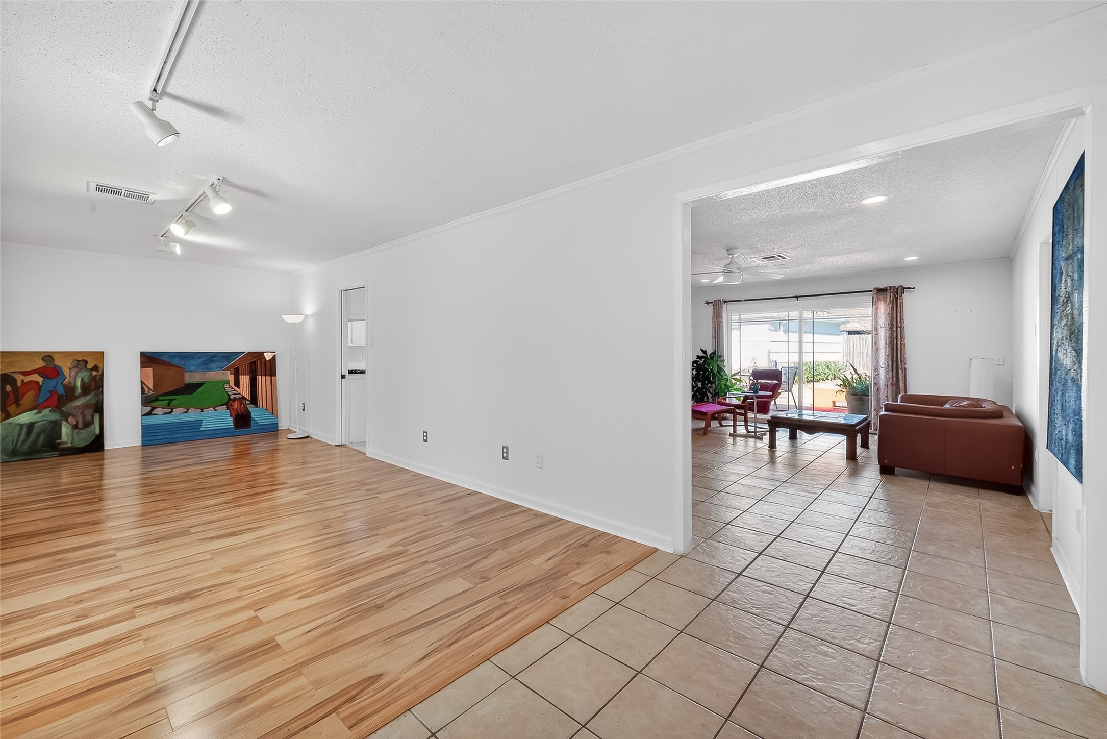 7014 Concho Street Houston, TX 77074 - Photo 5 of 46 This picture is your view if your back was to the front door. The living/dining rooms are to the left, family room straight ahead.