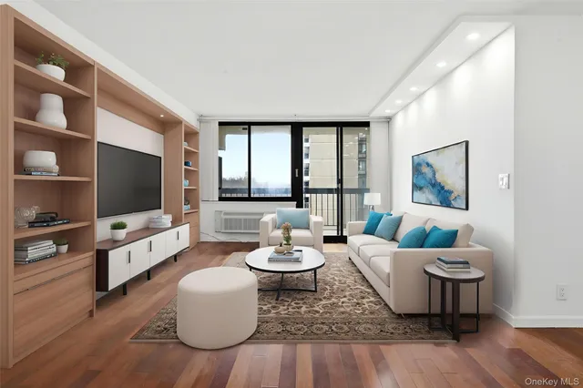 a bedroom with a bed and a potted plant