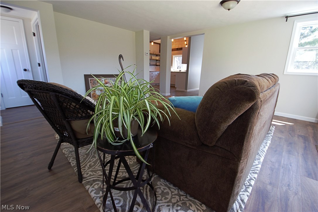 7670 Dewey Road Thompson, OH 44086 - Photo 21 of 34 Off the living room is a half bath plus access to the basement & side yard.