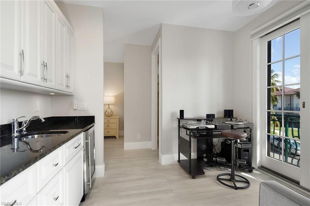 1160 Clam Court, Unit 3 Naples, FL 34102 - Photo 22 of 50 a kitchen with stainless steel appliances granite countertop a stove and a cabinets