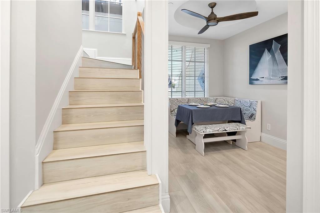 1160 Clam Court, Unit 3 Naples, FL 34102 - Photo 26 of 50 a living room with furniture and a wooden floor