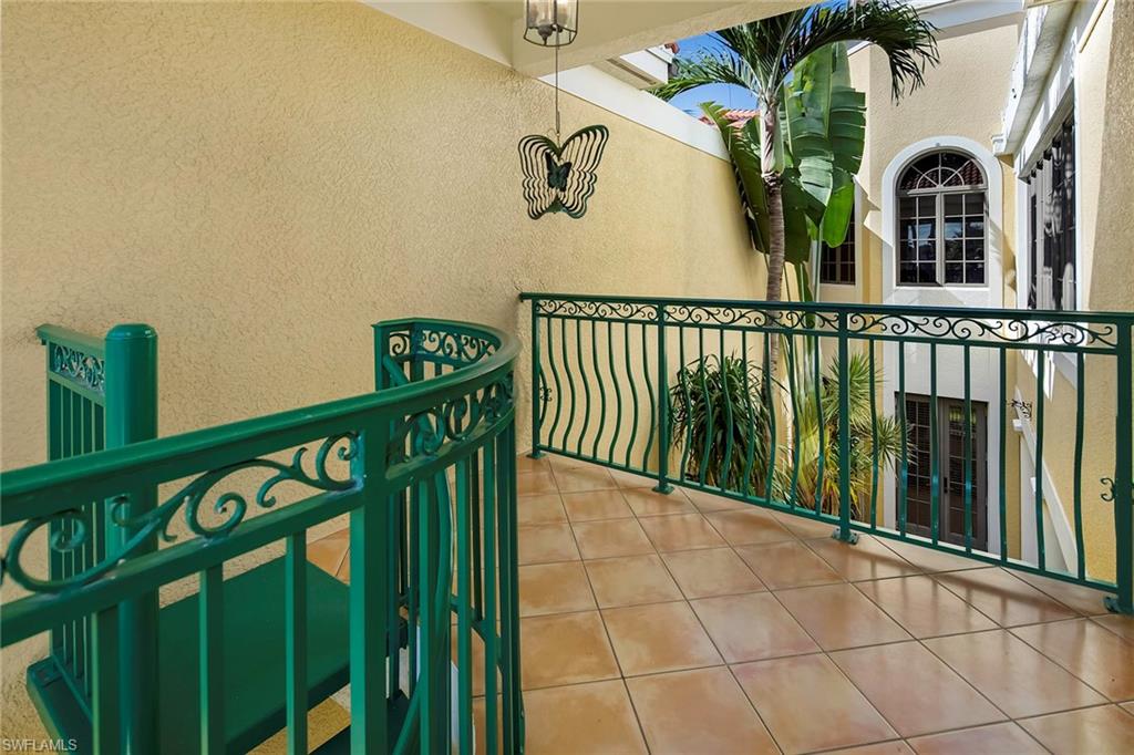 1160 Clam Court, Unit 3 Naples, FL 34102 - Photo 31 of 50 a view of balcony with potted plants